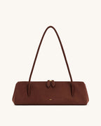 Brown handbag with a strap on a white background