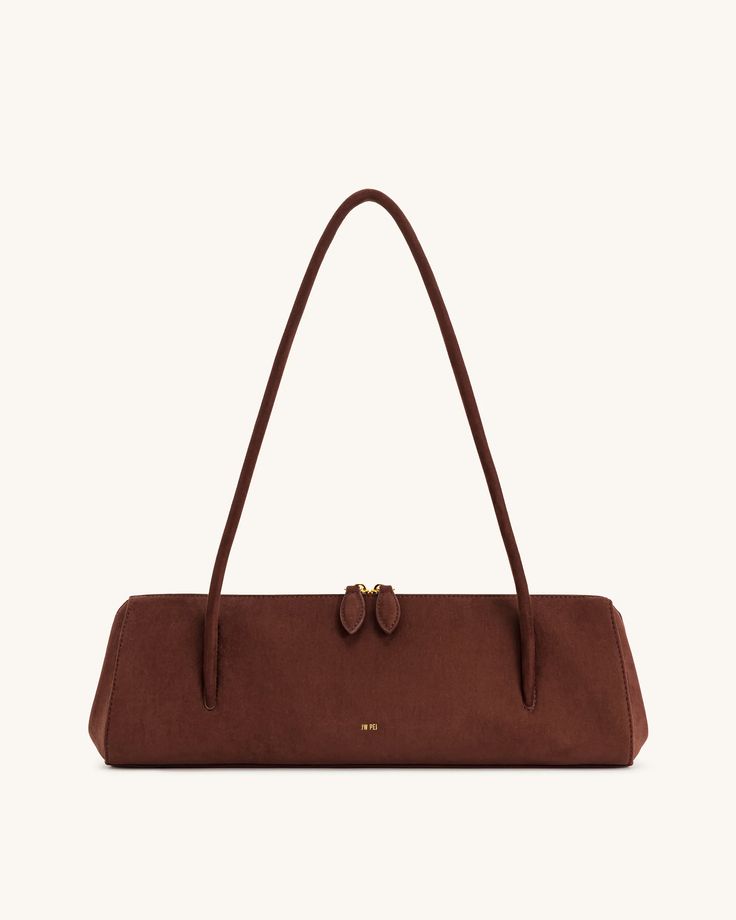 Brown handbag with a strap on a white background